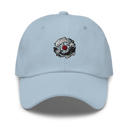 Light blue Haruja dad hat with black and white Japanese koi fish circle and red sun graphic embroidered on the front