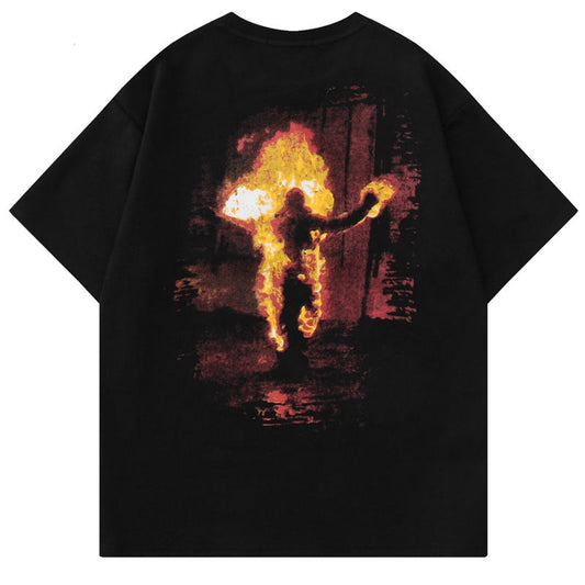black t-shirt with a man running on fire